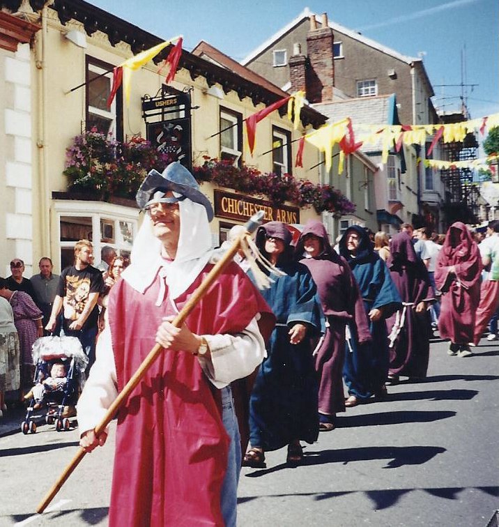 Monks in the Pilton Festival Parade in front of The Chichester Arms in 2001