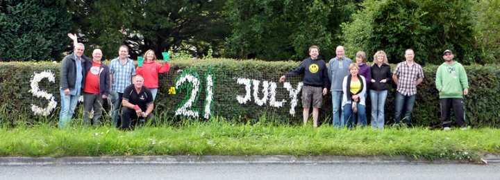 Putting up the North Road Banner for Pilton Festival Green Man Day 2012