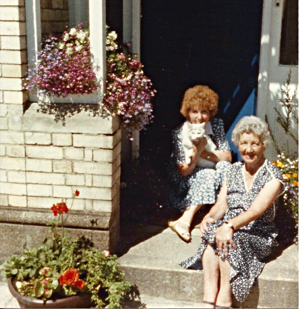 Phyllis Allen and Connie Barnes on the doorstep of 123 Pilton Street, Pilton