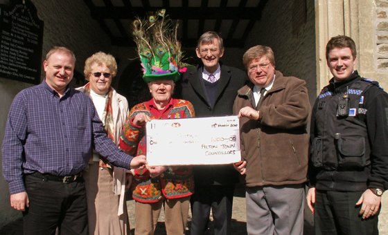Pilton Festival receives cheque from Barnstaple Town Council in 2010